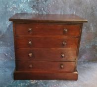A Victorian miniature chest, apprentice piece, with four long drawers, turned handles, plinth