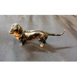 Austrian School, a cold painted bronze, of a Dauschund, 8cm lomg