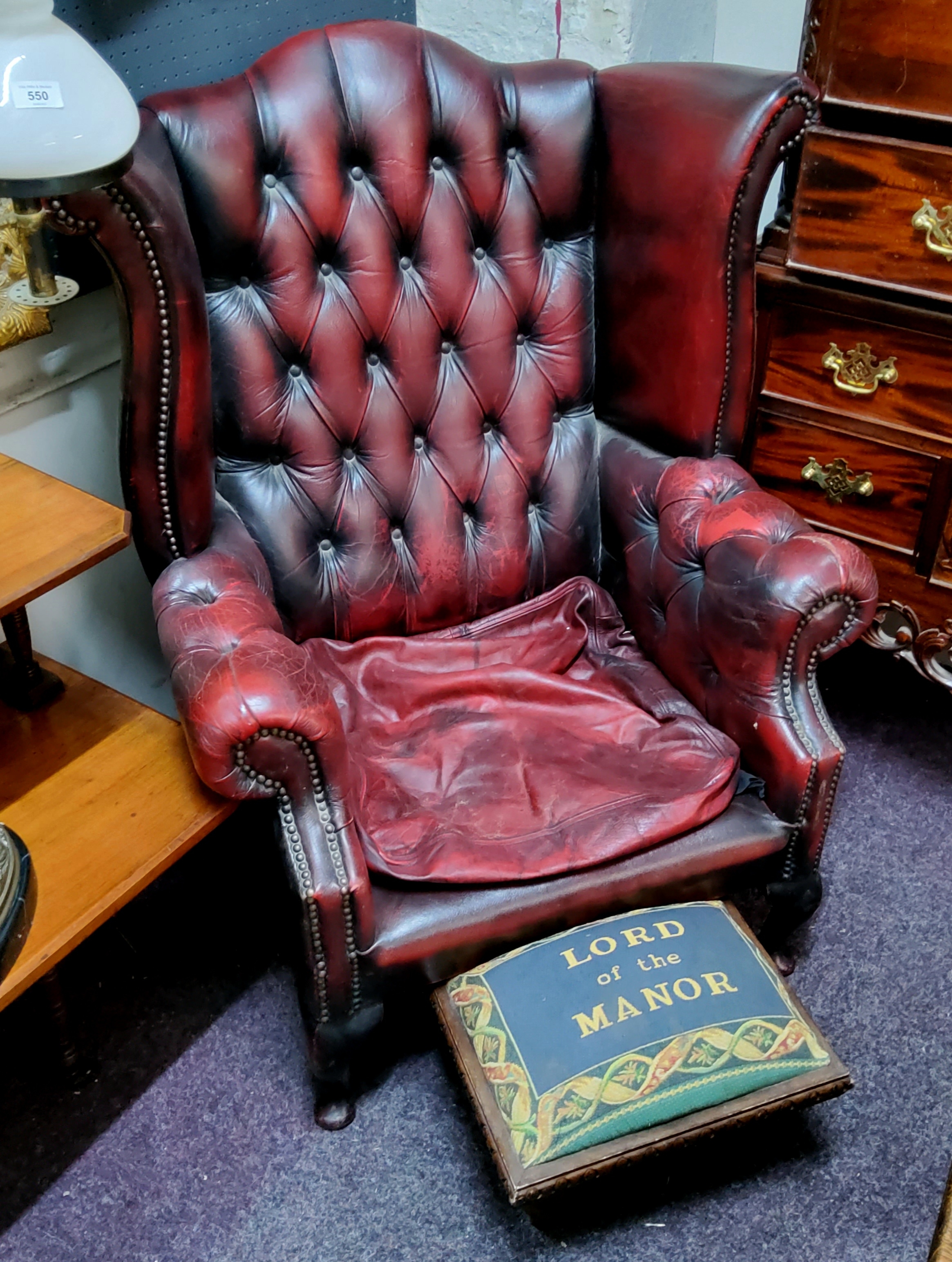 An ox blood red leather Chesterfield wingback armchair, deep button backed; Lord Of The Manor - Image 2 of 2