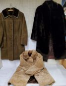 A lady's wool three-quarter coat, fur collar;  a 1960's/1970's Hea Tona sheepskin coat;  etc (3)