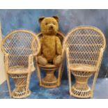 Three wicker doll's wicker chairs, 40cm high;  a jointed teddy bear, straw-filled, 43cm high