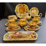 An Aynsley Orchard Gold pattern tea service, comprising teapot and cover, milk jug, sugar bowl,