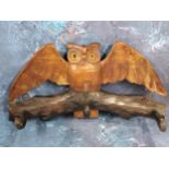 A Victorian novelty coat book, carved with an owl with wings outstretched, three hooks, 32cm wide