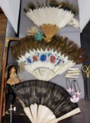 A lady's feathered fan, bone sticks, 45cm wide;  other fans;  bone cane handle;  pocket knives;