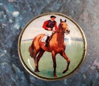 A 19th century circular snuff box, the cover enamelled with horse and jockey, marked 925