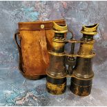 A pair of World War I military binoculars, leather case