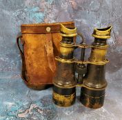 A pair of World War I military binoculars, leather case