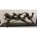 Libra Company, bronzed resin, Grey Hounds Running, rectangular base, 53cm long (AF)
