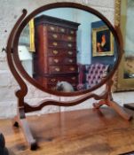 A 19th century mahogany, satinwood and ebony barberpole strung oval dressing table mirror,