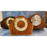 A walnut mantel clock, Arabic numerals, three winding holes, 23cm high, c.1940;  another, stained