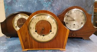 A walnut mantel clock, Arabic numerals, three winding holes, 23cm high, c.1940;  another, stained