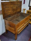 A 19th century light oak housekeeper's chest, the hinged top revealing panelled storage, fielded