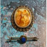A silver and marcasite oval brooch, set with a porcelain plaque decorated with a classical scene,