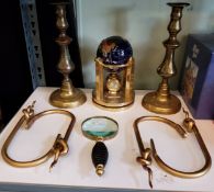 Four gilt metal curtain tie-backs;  a brass ejector candlestick;  a table top specimen globe;  a