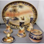 A Noritake Bedouin pattern dressing table set, comprising a tray, two candlesticks, a hat pin