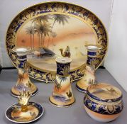 A Noritake Bedouin pattern dressing table set, comprising a tray, two candlesticks, a hat pin