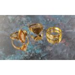 An 18ct gold three stone ring set with old cut round diamonds, approx. 0.5ct total, size K, 3.36g; a