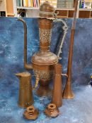 A large Persian copper coffee pot, embossed with strapwork, brass handle, 73cm high;  a copper