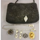 A lady's sequin evening bag;  fashion brooches, rings, etc