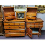 Pine Furniture - a pair of bedside table cabinets; a chest of four long drawers and a cupboard (4)