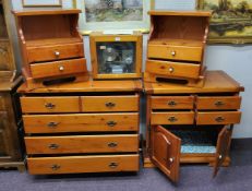 Pine Furniture - a pair of bedside table cabinets; a chest of four long drawers and a cupboard (4)