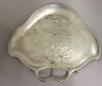 An Art Nouveau cast pewter dish by Achille Gamba, Italian embossed with sycamore leaves and seeds,