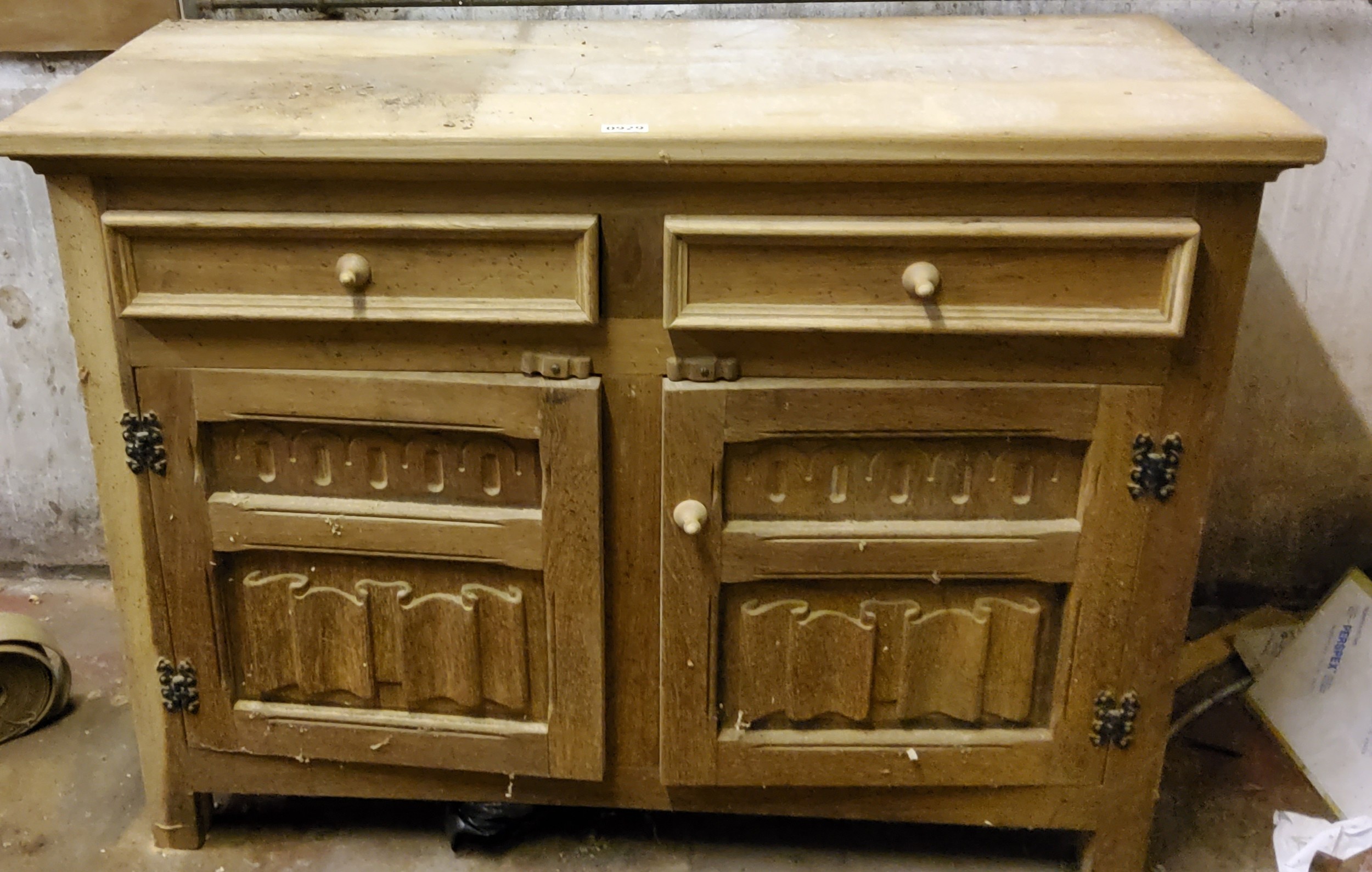 A mid 20th century oak side chest, of two short and two fielded panelled door Please note this lot