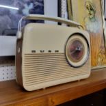 A vintage Bush radio, butterscotch and cream coloured c.1970