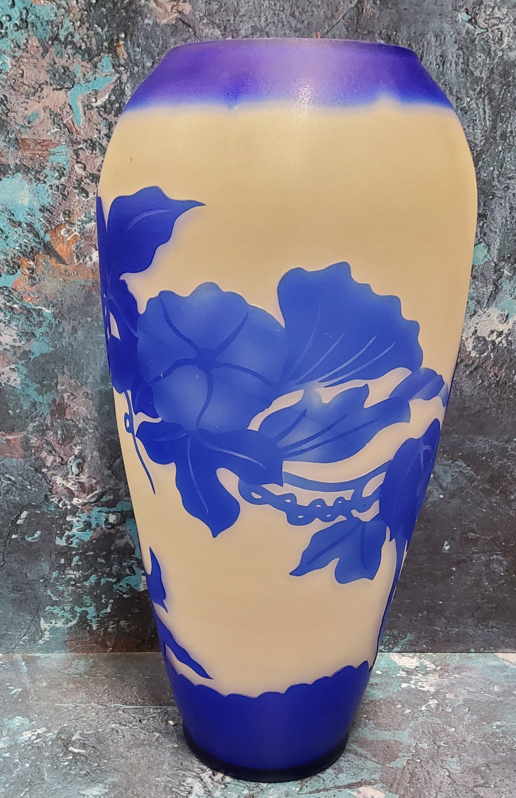 An Art Glass ovoid vase, etched with in blue with honeysuckle, on a white ground,  bears signature