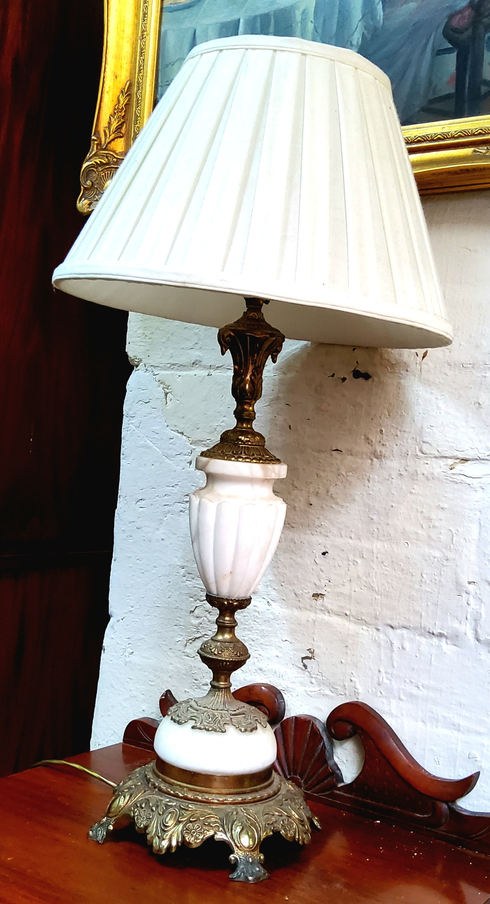 A gilt metal and Carrara marble table lamp