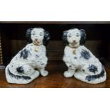 A pair of Staffordshire spaniels, early 20th century