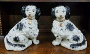 A pair of Staffordshire spaniels, early 20th century