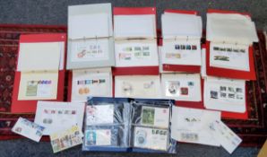 Stamps - A collection of Elizabeth II first day covers including first day numismatics examples,