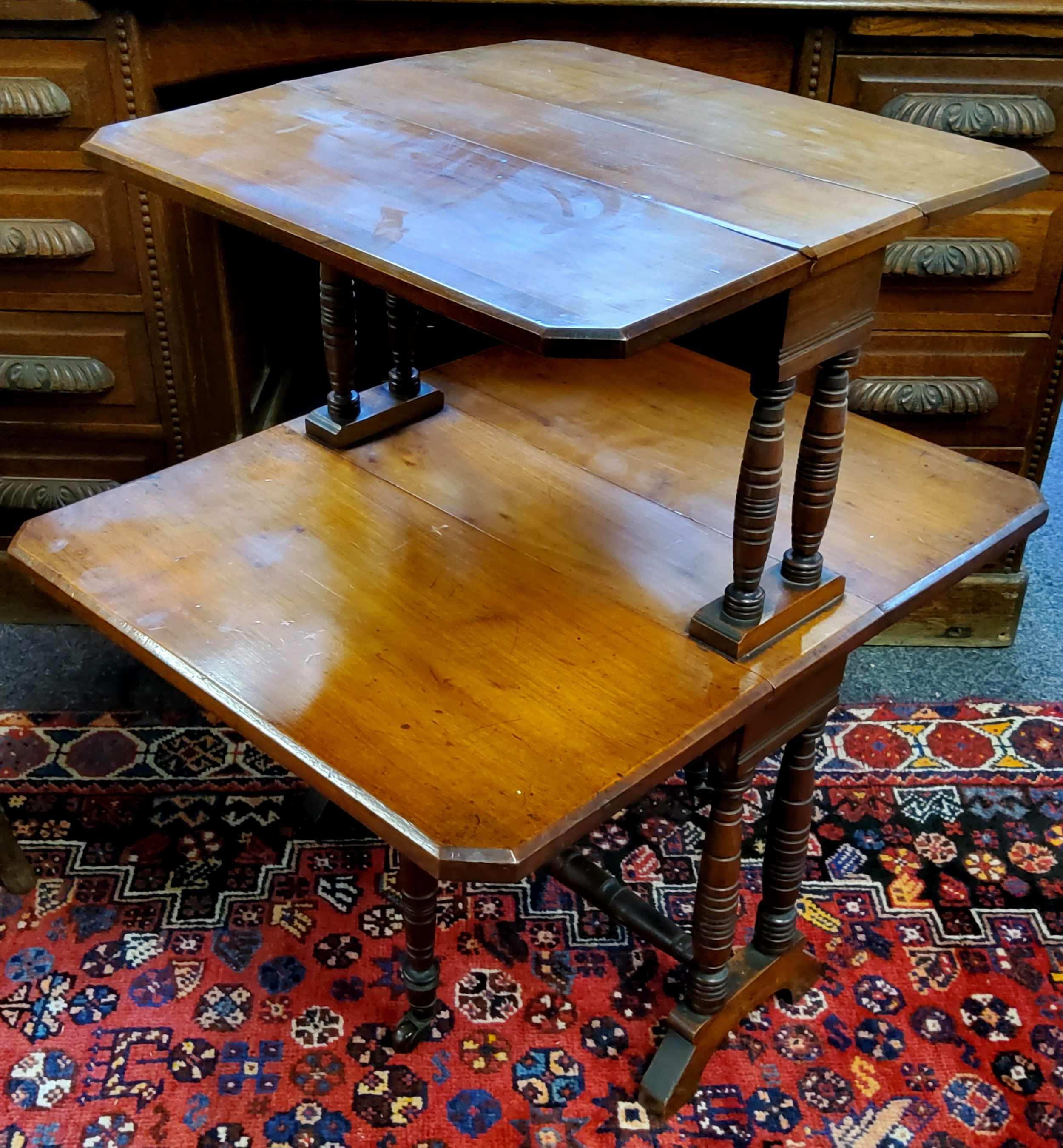 A Victorian walnut two-tier Sutherland gateleg occasional table, each with canted corners on - Image 2 of 3