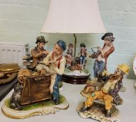 A Capo-di-Monte figural table lamp, modelled by Menegheth, of a boy, girl and hound, wooden base;