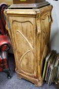 An Art Nouveau stripped pine cabinet, whiplash applied details (A/F)