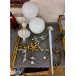 A pair of white opaque glass globular shades;  two stair rods;  garden cast iron bracket;  etc