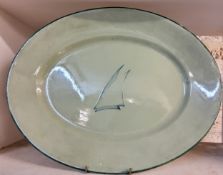 A Moorcroft Yacht pattern oval meat plate, tube lined with yacht, picked out in blue on an olive