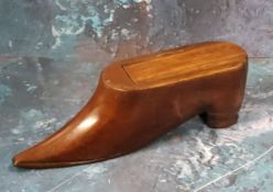 A 19th century novelty snuff show, in the form of a pointed shoe, 11cm long