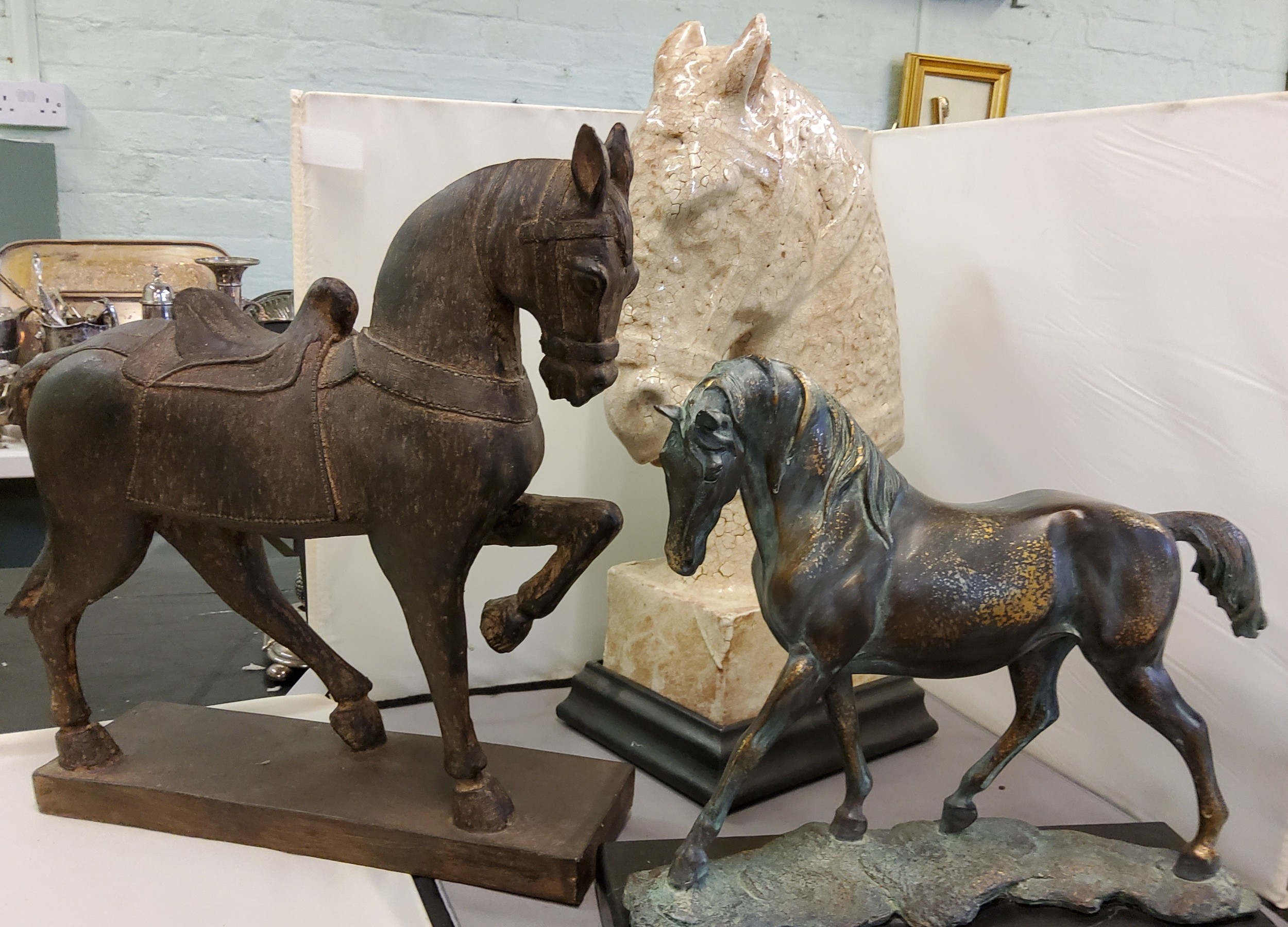 A bronzed resin, Horse, rectangular base, 29cm high;  others, Tang style, 36cm high;  another (3)