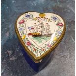 An 19th century heart-shaped enamelled patch box, the cover decorated with three mast ship in a