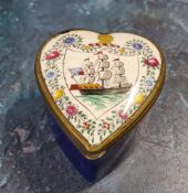 An 19th century heart-shaped enamelled patch box, the cover decorated with three mast ship in a