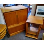 A mid century G Plan teak panelled cabinet and G plan red label glass fronted music cabinet (2)