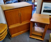 A mid century G Plan teak panelled cabinet and G plan red label glass fronted music cabinet (2)