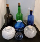 Glassware- an Art glass vase, swirled in blue;  candle night light globular vases;  coloured bottles