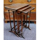 An early 20th century mahogany nest of three tables, Regency Revival, rectangular tops with