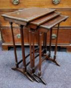 An early 20th century mahogany nest of three tables, Regency Revival, rectangular tops with