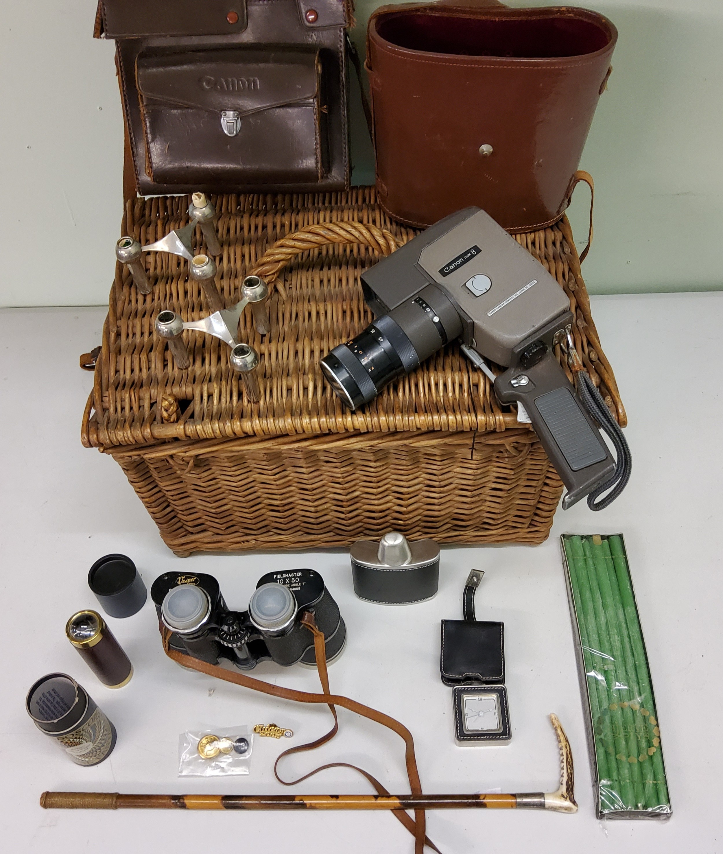 A wicker hamper;  a hunting crop, horn handle;  Vesper Fieldmaster 10 x 50 binoculars, cased;  a