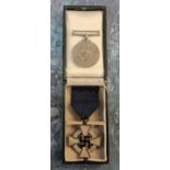 A WWII Second World War Third Reich German Nazi 25 Year Service medal with ribbon and original