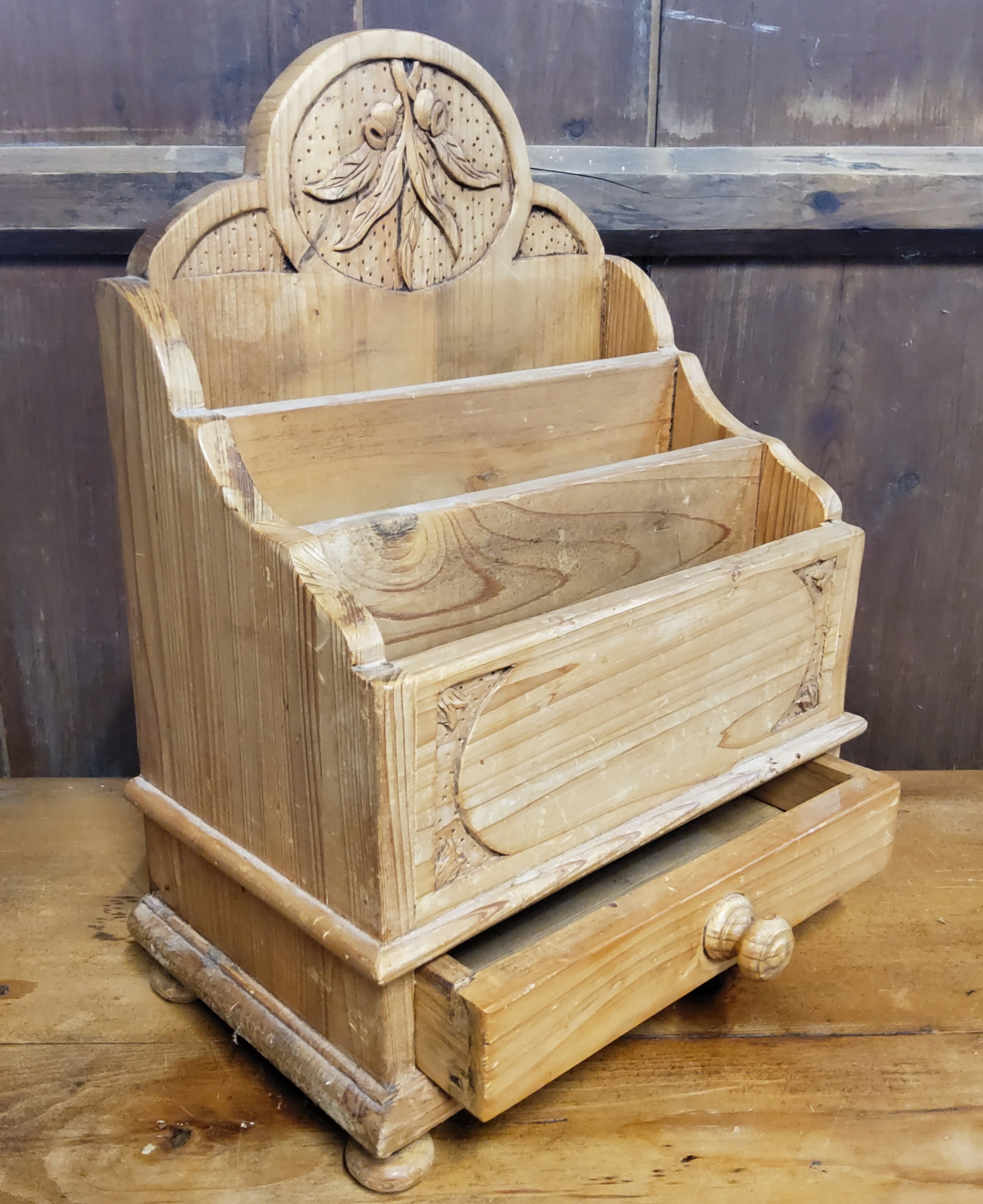 A substantial farmhouse pine letter rack above one drawer, the back panel carved with fruiting - Image 2 of 2